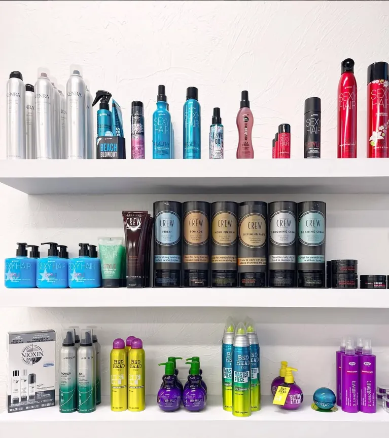 The retail shelves at Smart Cuts, three rows of styling and care products